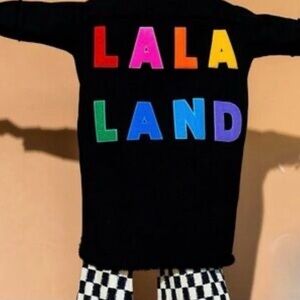 Dressed in LaLa black long jean jacket